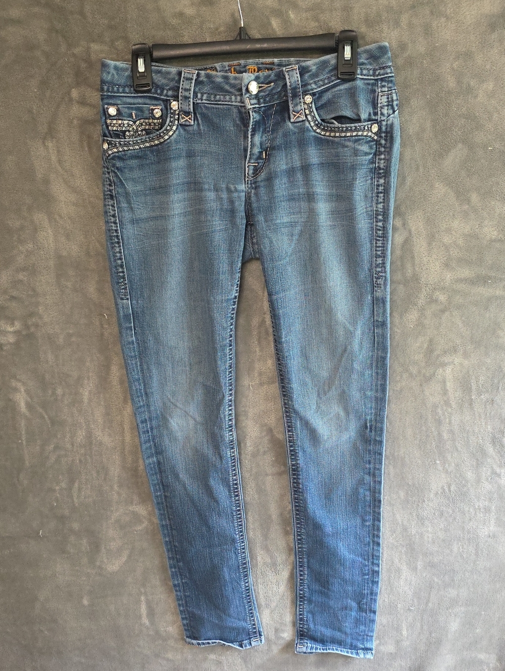 Rock Revival Women's Skinny Blue Jeans with Embellished Pockets